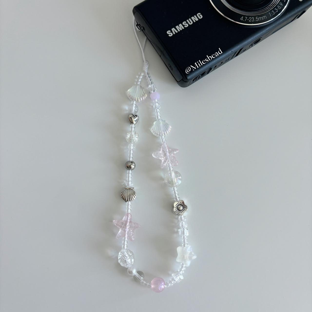 "Oceanic Charms" beaded phone charm with a mermaid theme